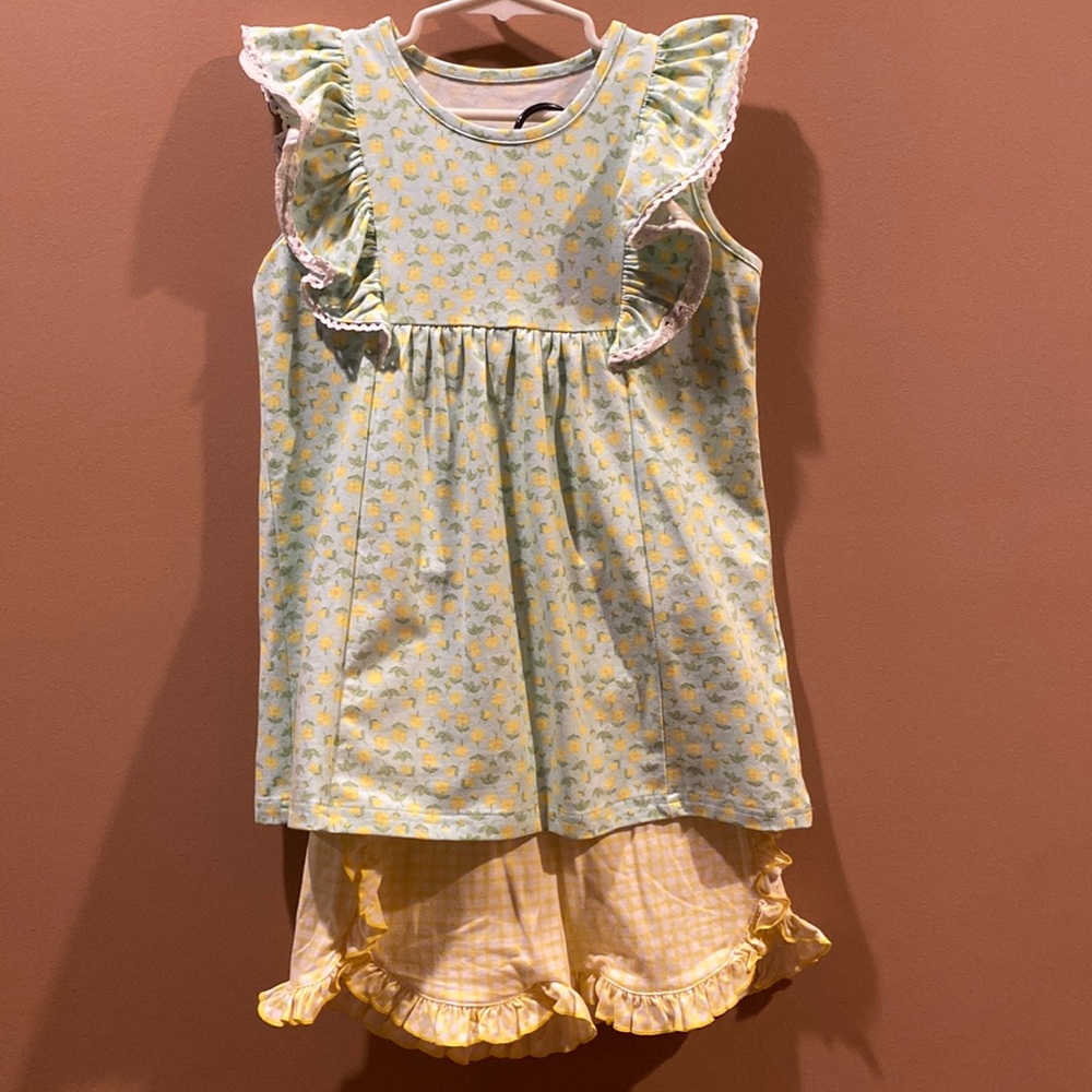 Shrimp&Grits shirt and short set.  Barely worn. Girls L 7/8.  Blue and yellow
